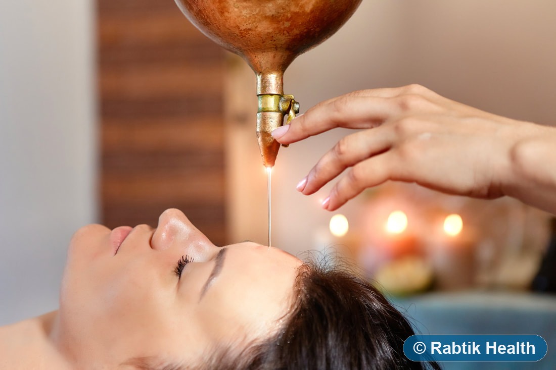 Shirodhara calming oil therapy